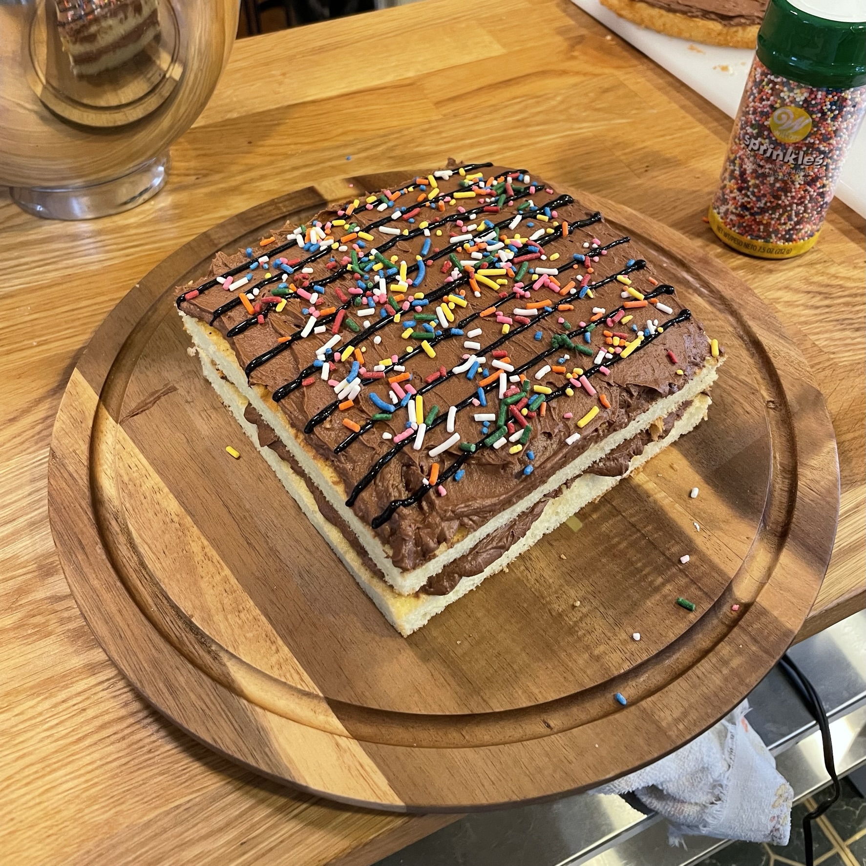Cake with lines and sprinkles on it to illustrate a method of approximating pi.
